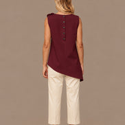 Maryley Abbigliamento Top asimmetrico con spilla a fiore 